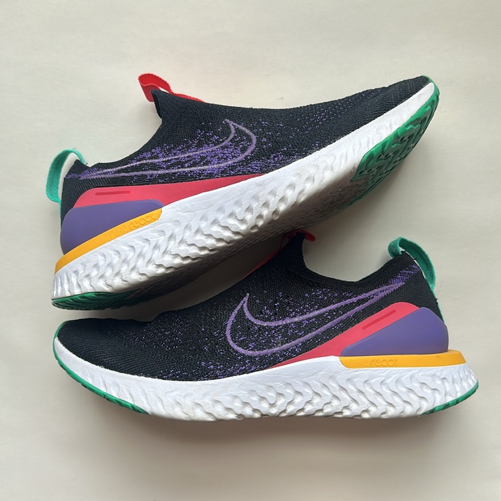 Nike epic react slip on shoes size 8W black with neon details.